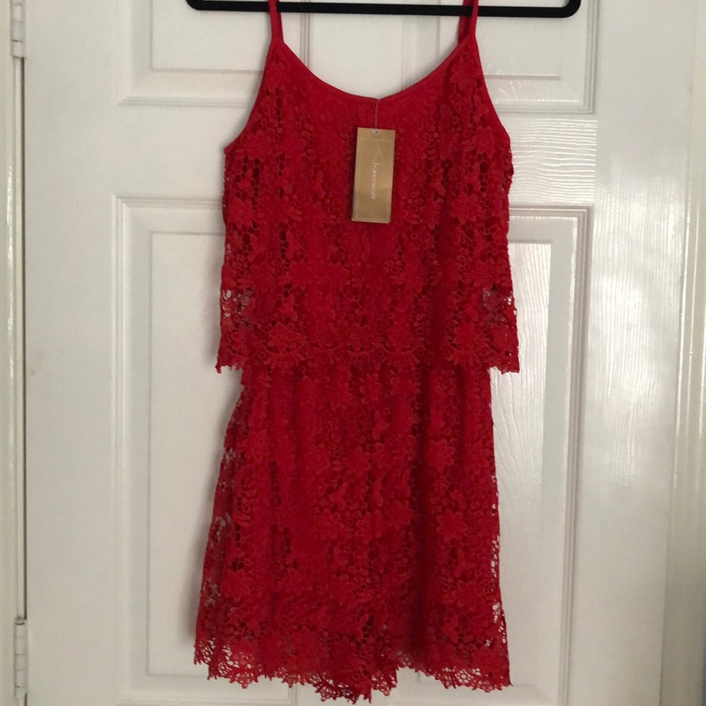Red crocheted lace jumper by Alya. New With Tags